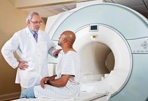 Doctor talking with patient before MRI