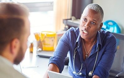 Doctor talking to patient