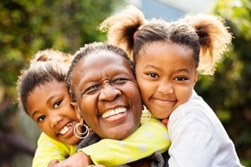 Grandmother and grandchildren happy together