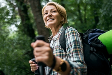Older woman hiking in nature