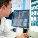 Doctor studying brain scans