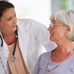 Older woman talking to her doctor about memory problems