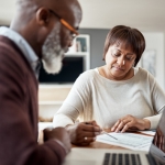 Older couple reviewing documents